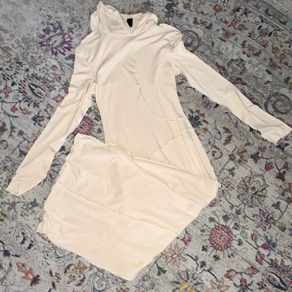 Cream hooded sweater tshirt dress, midi length. Form fitting